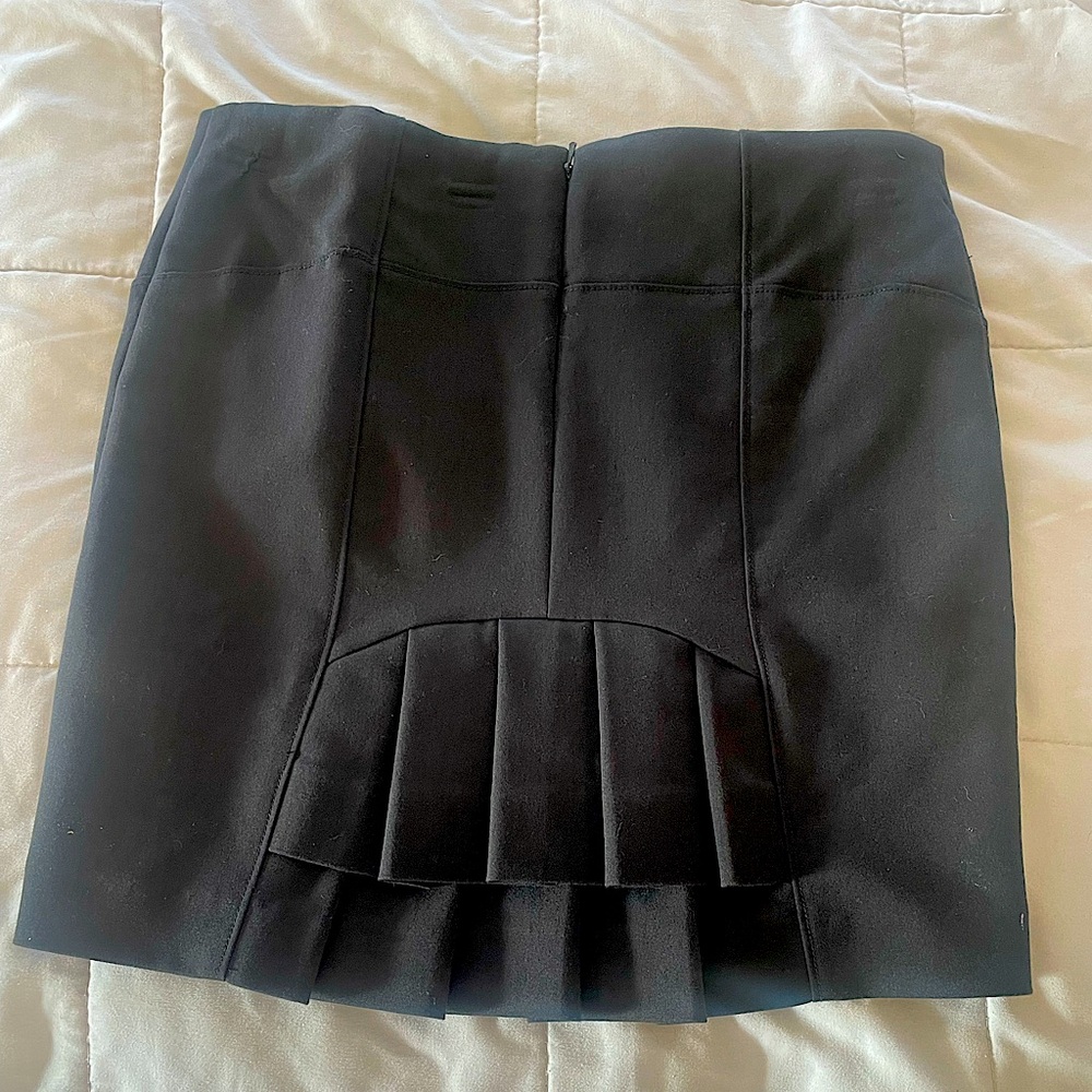 Bebe mini skirt; never worn; size 2